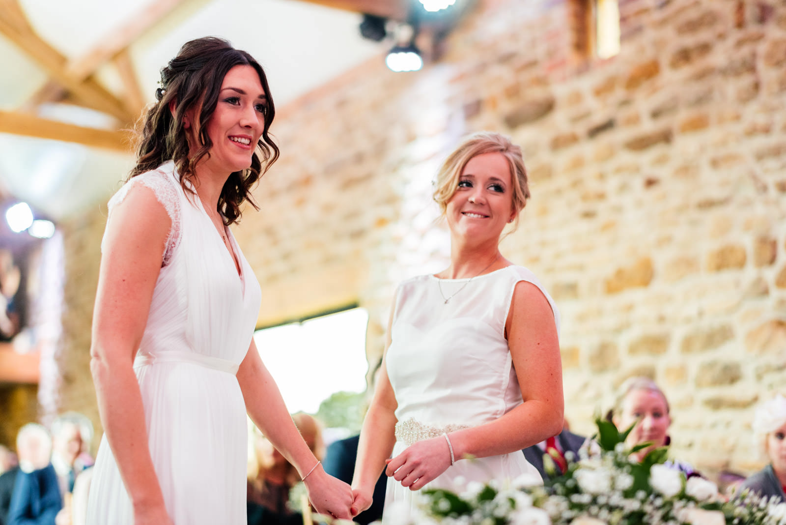 Two brides during wedding ceremony