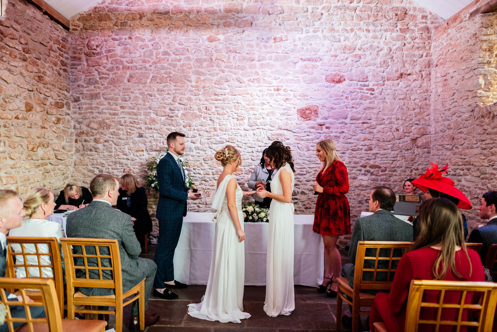 Brides exchanging wedding rings