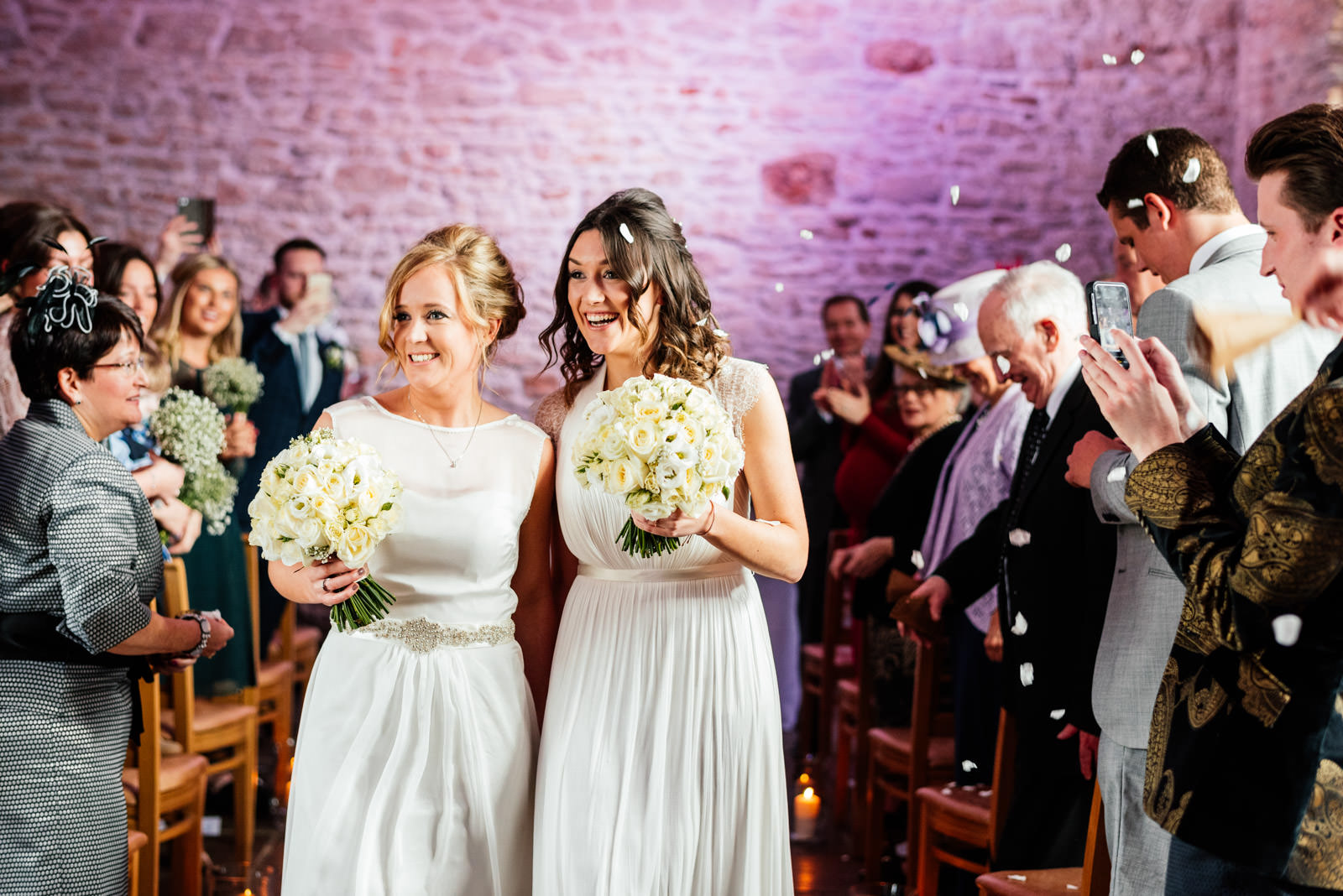 brides leaving wedding ceremony