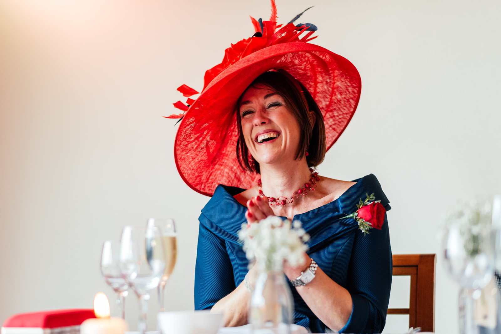 Mother of the bride laughing