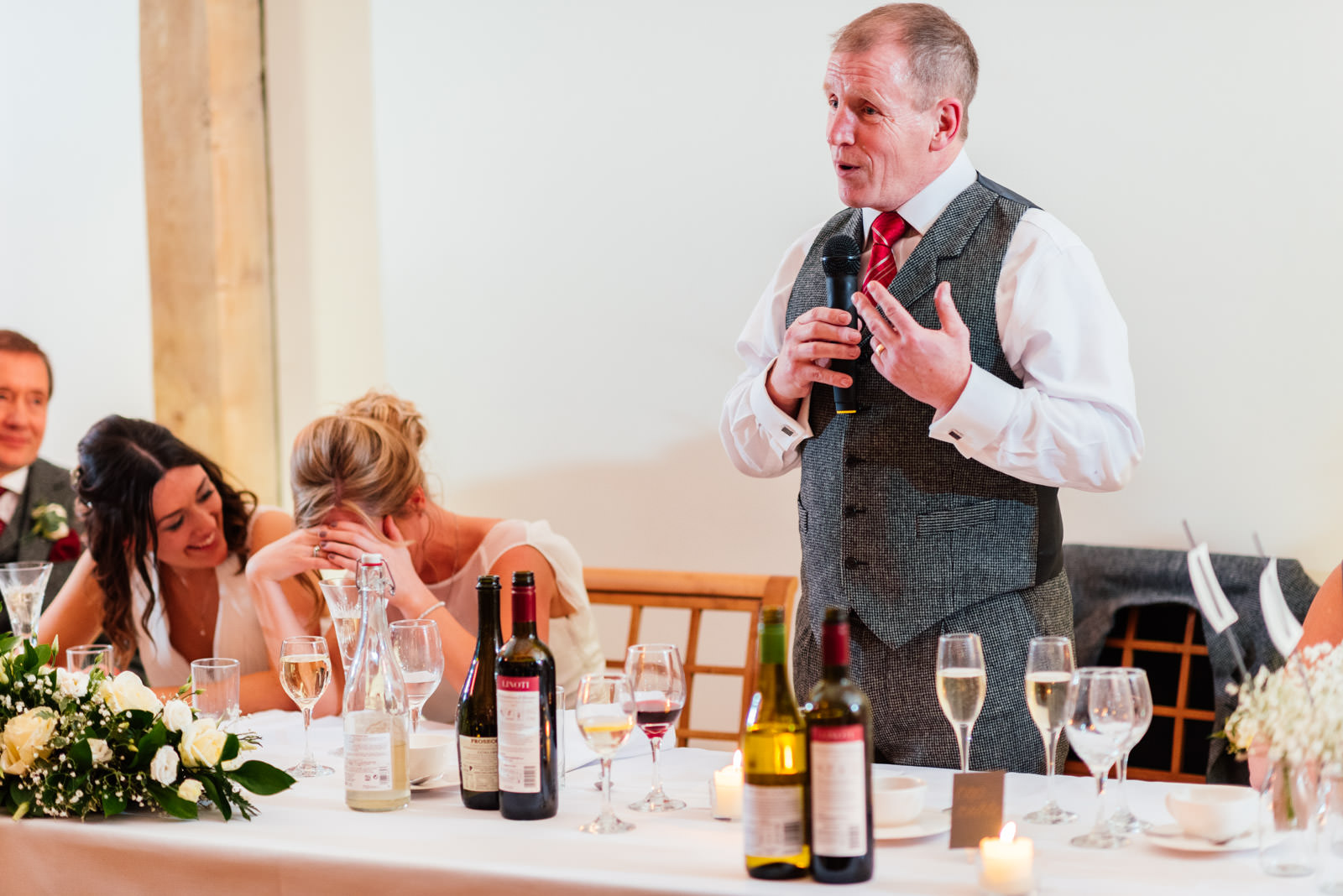 Brides father telling embarrassing story during speeches