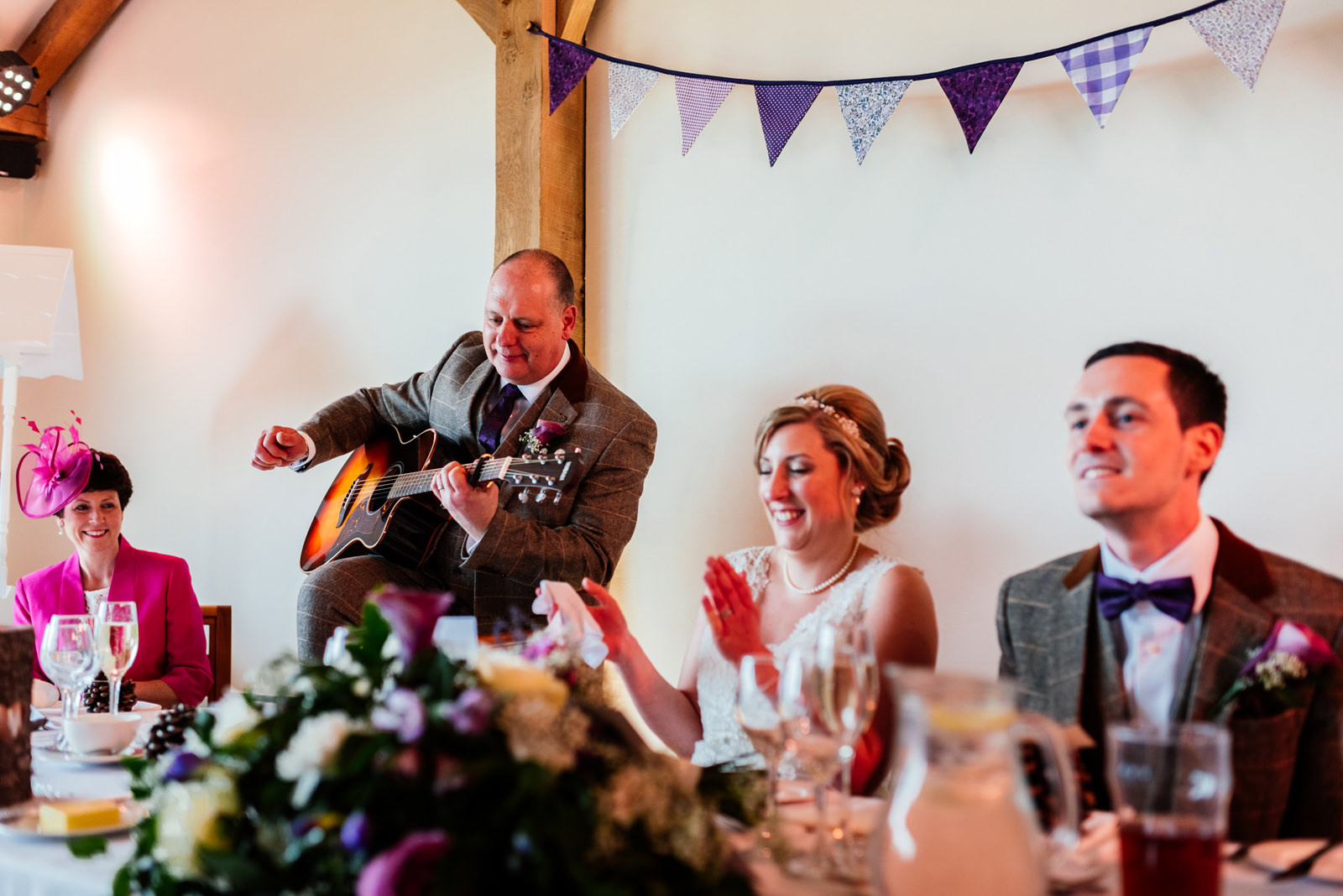 father of the bride playing guitar