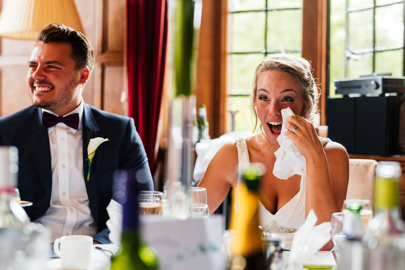 bride laughing at speeches