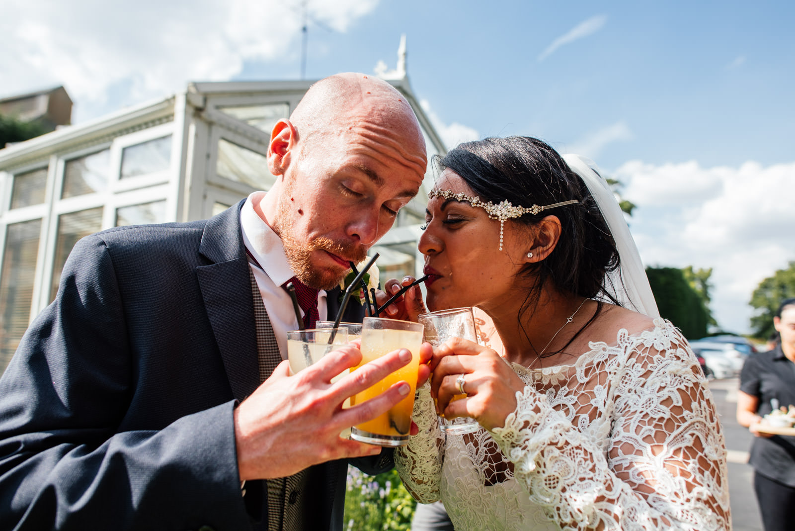 bride and groom having reception drinks