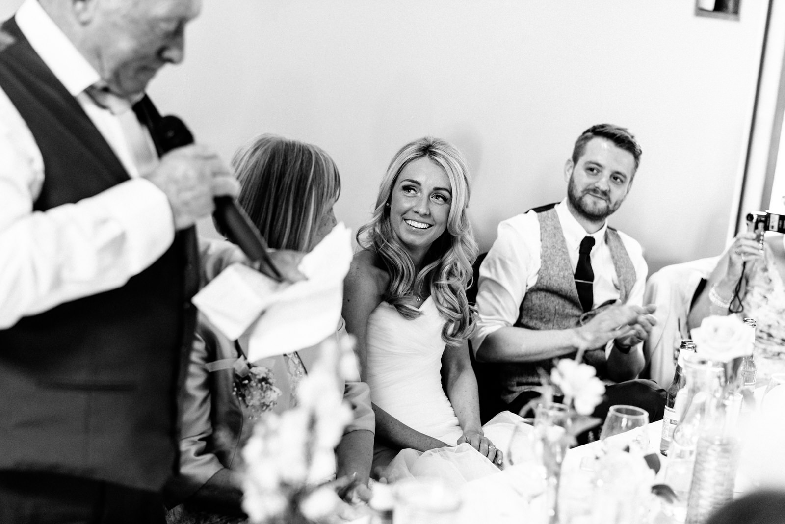 bride laughing at father's speech