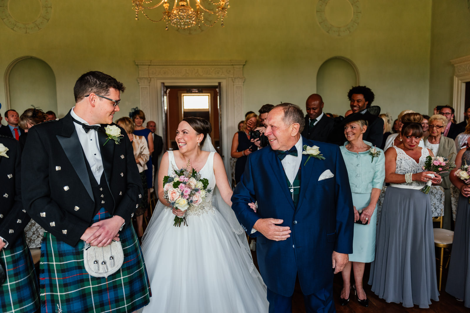 bride sees groom for the first time at the ceremony