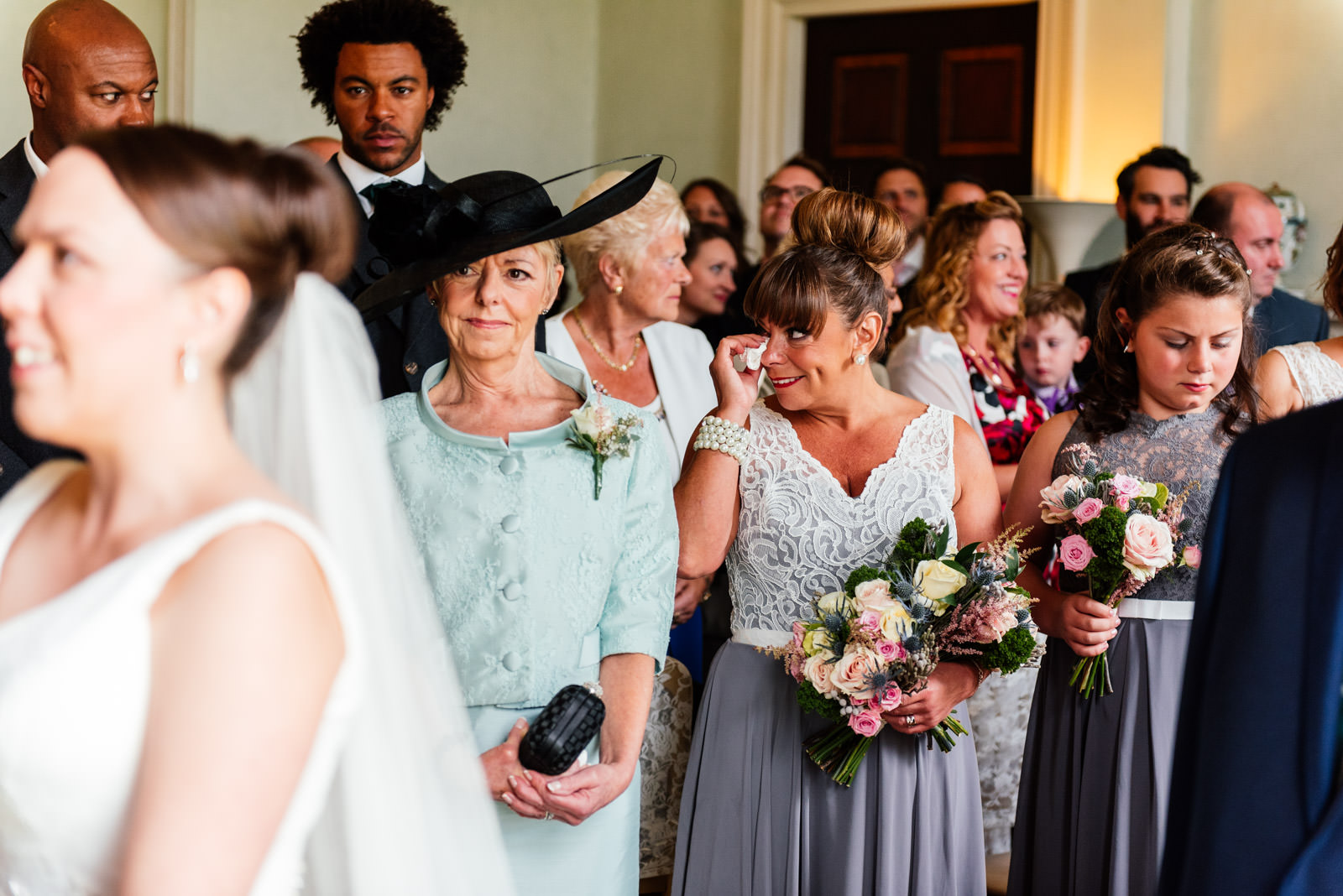 bridesmaid crying during the ceremony