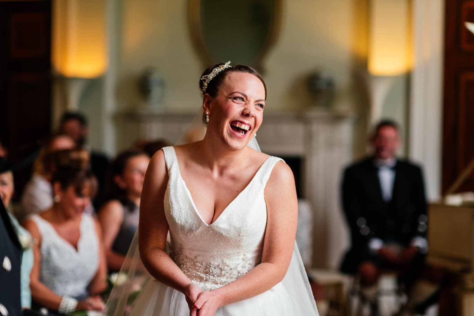 bride laughing during the ceremony