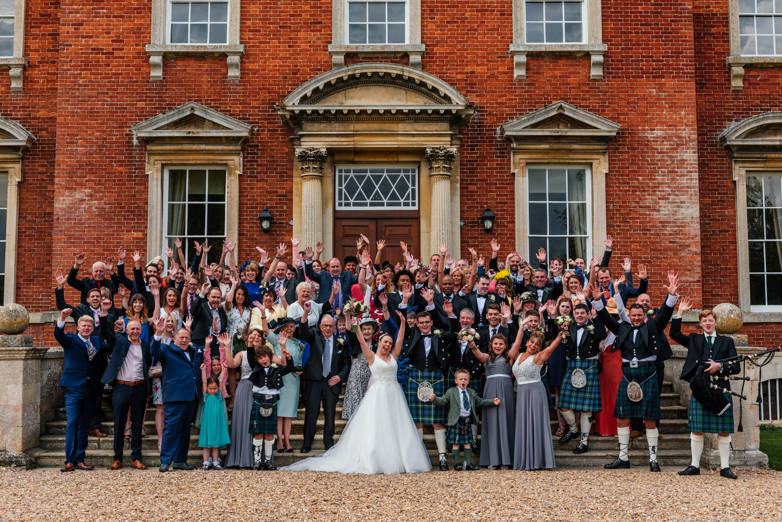 group photo at the front of kelmarsh hall