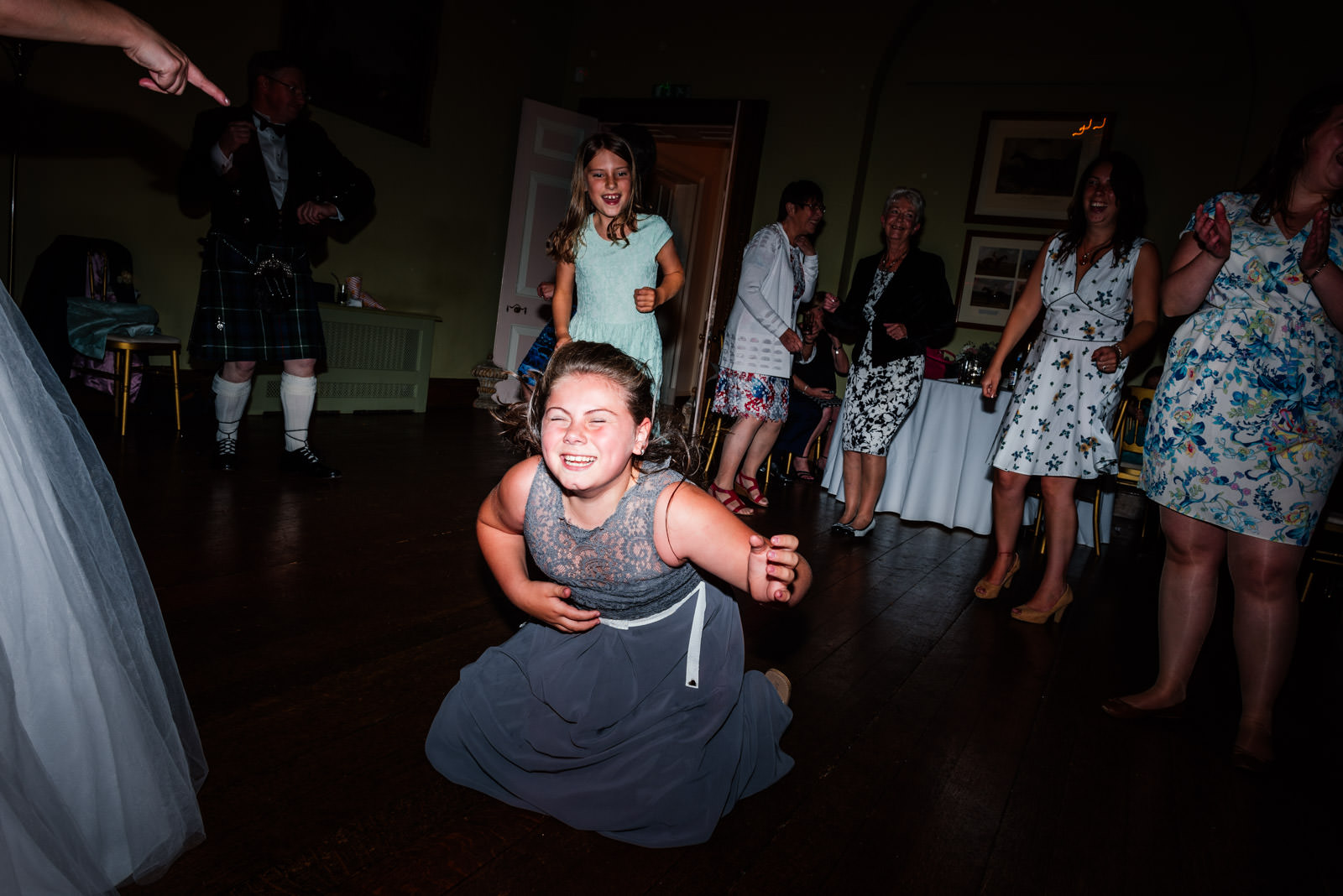 bridesmaid heading banging on the dance floor