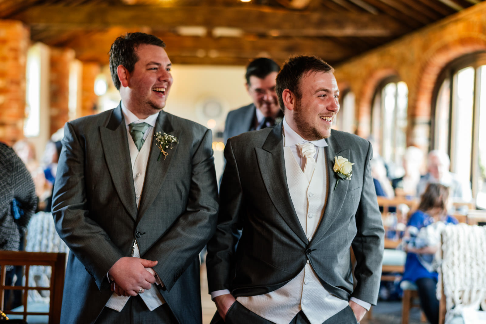 groom and best man waiting for the bride