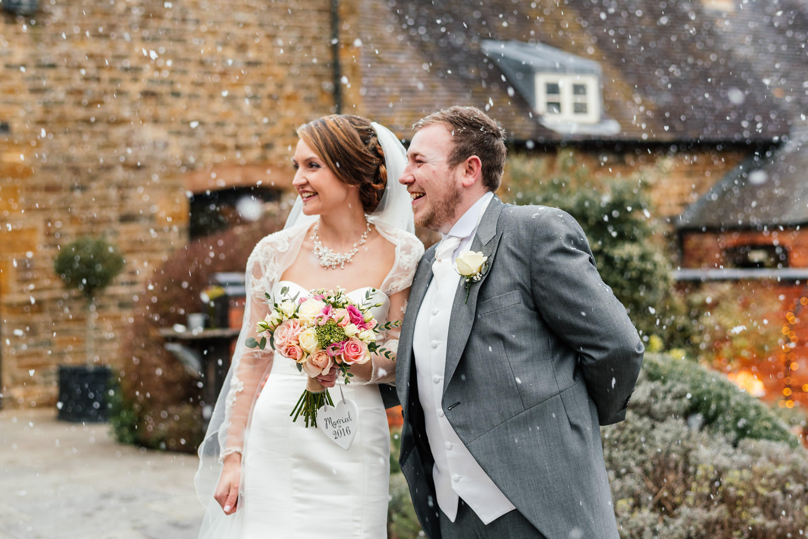 bride and groom in the snow