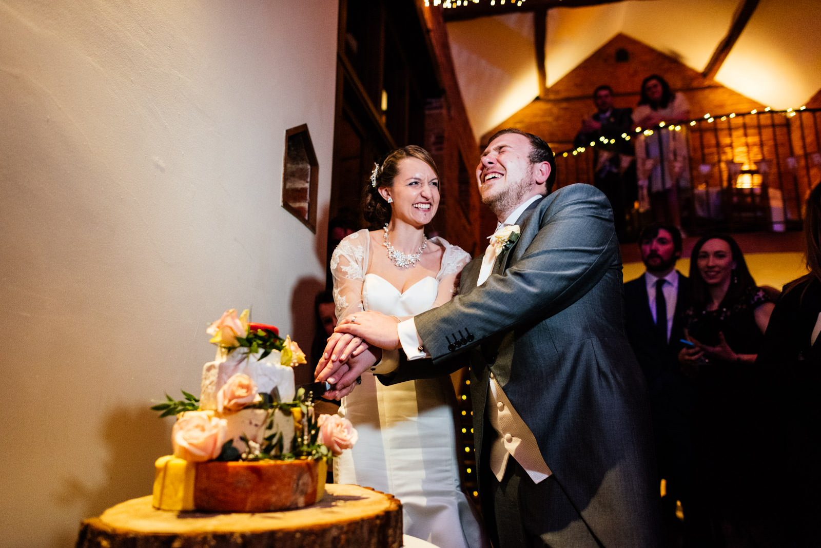 cutting the cake of cheese