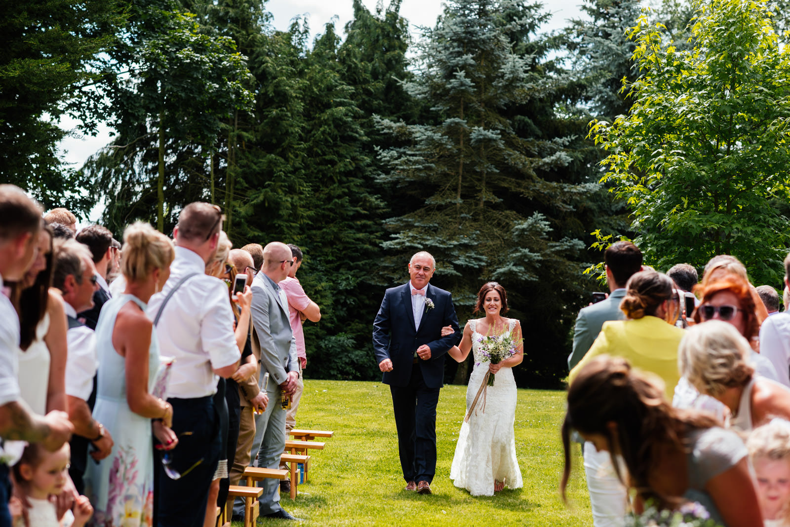 father walking the bride down the aisle