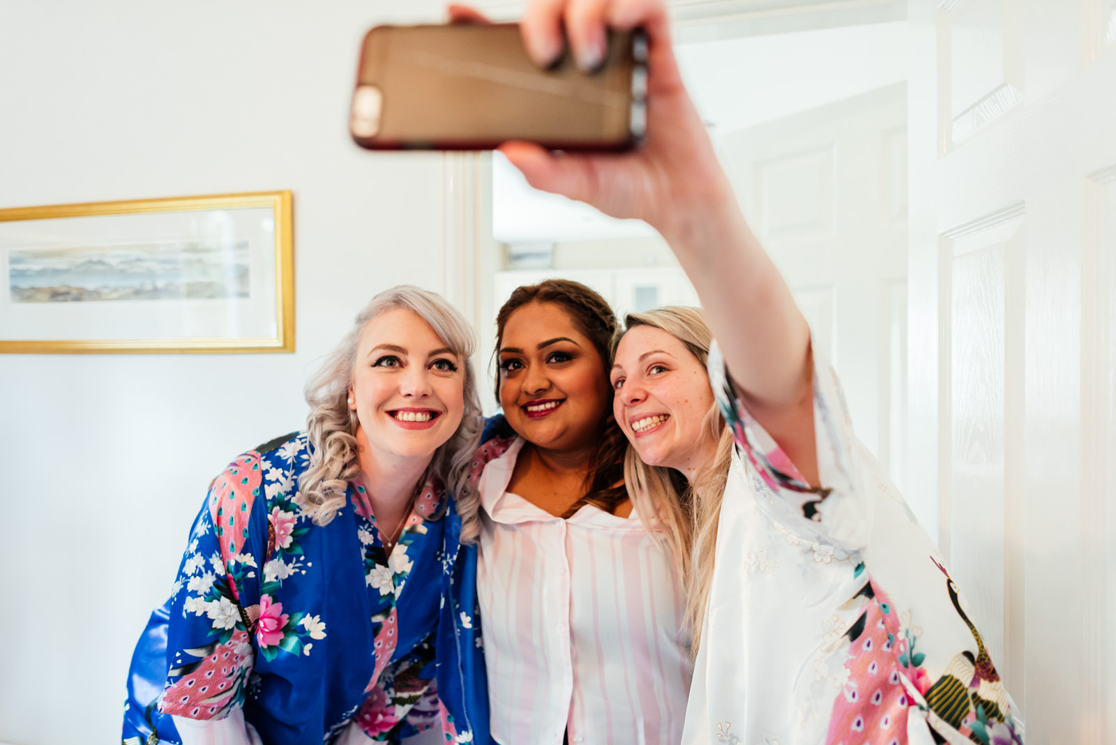 bridesmaids and bride doing a selfie