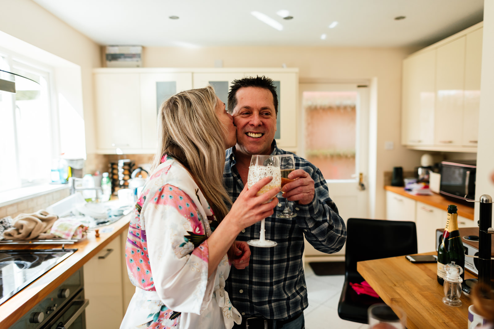 bride with her father on the morning of her wedding