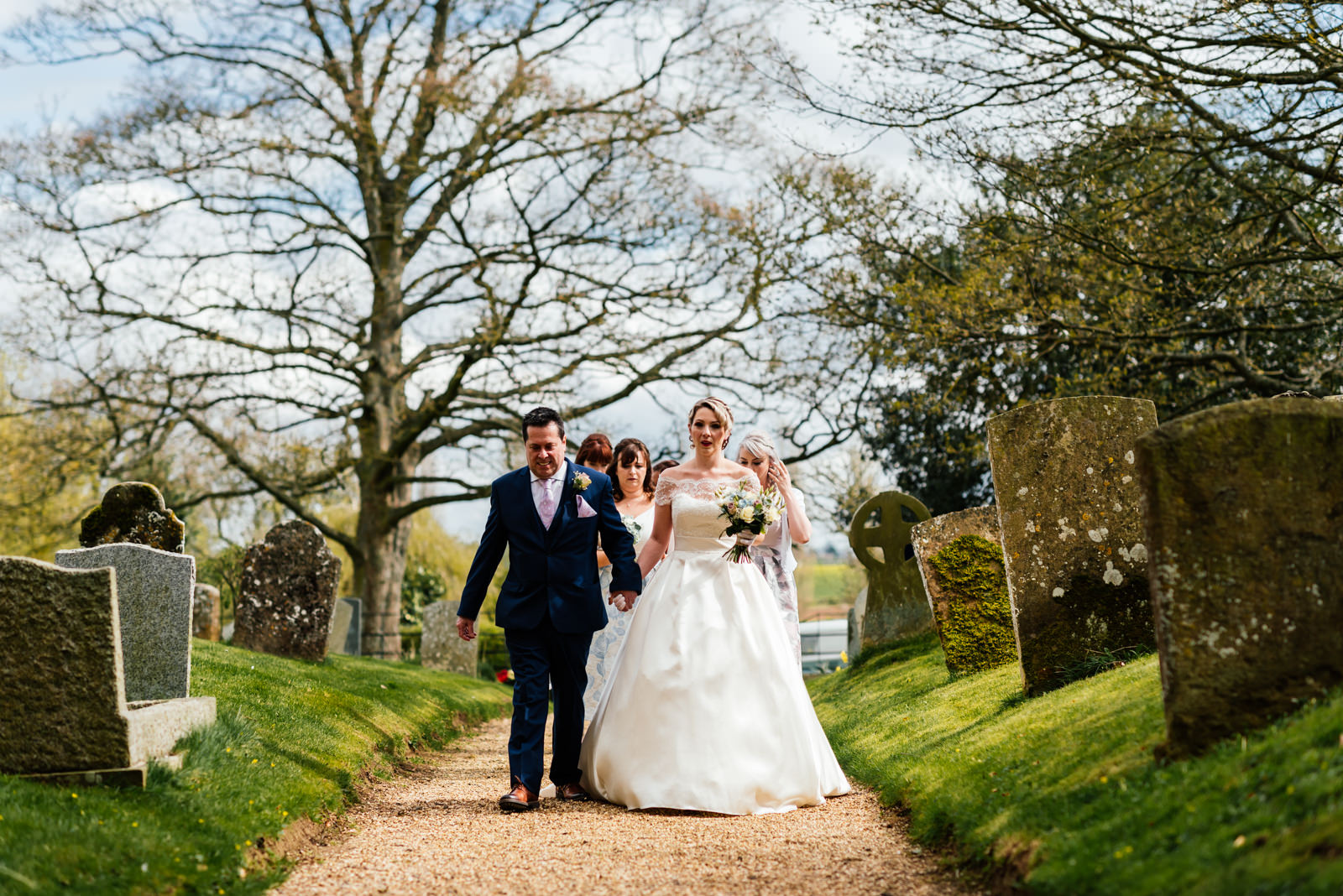 father of the bride walking bride up the church path