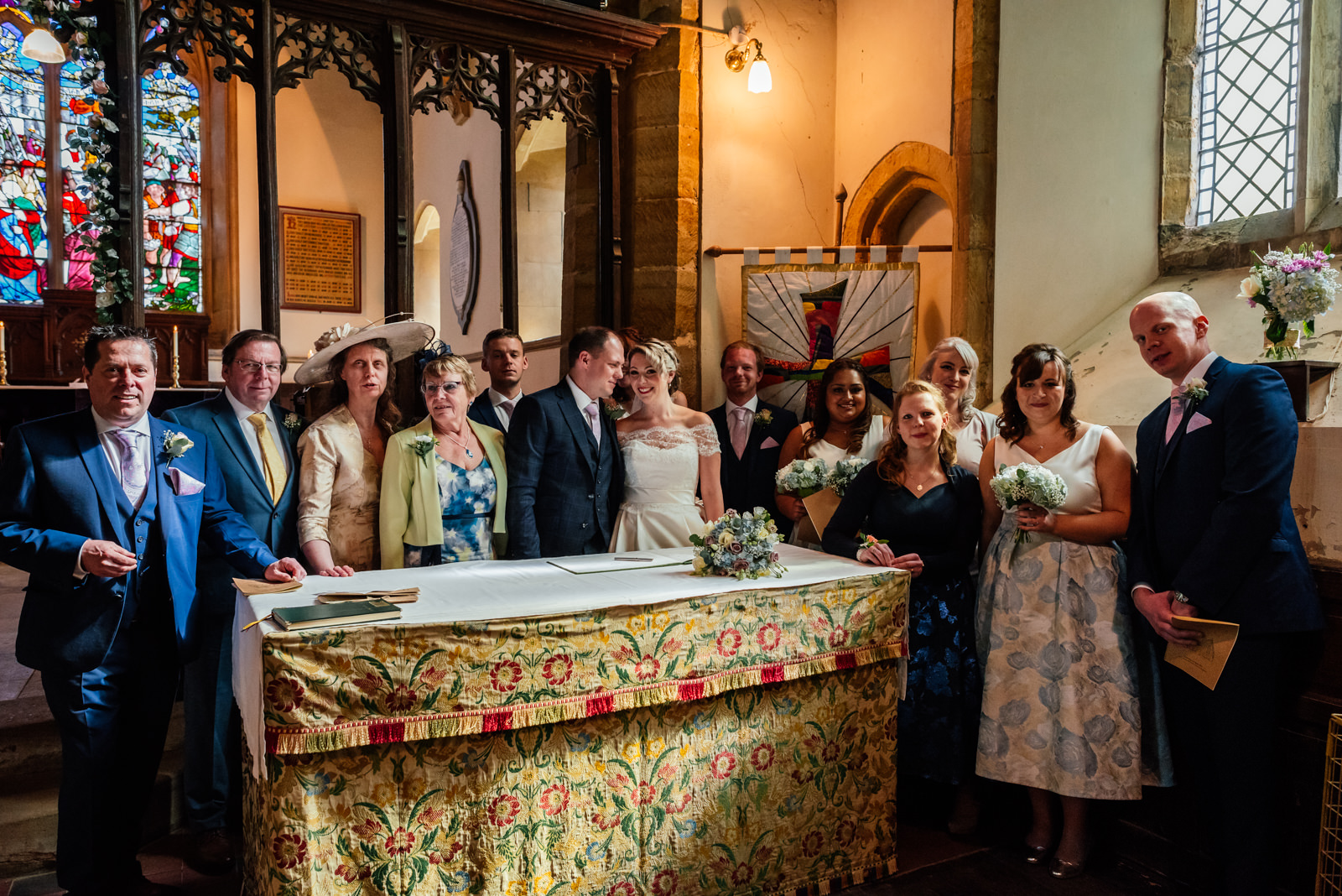 photo of witnesses and family in church