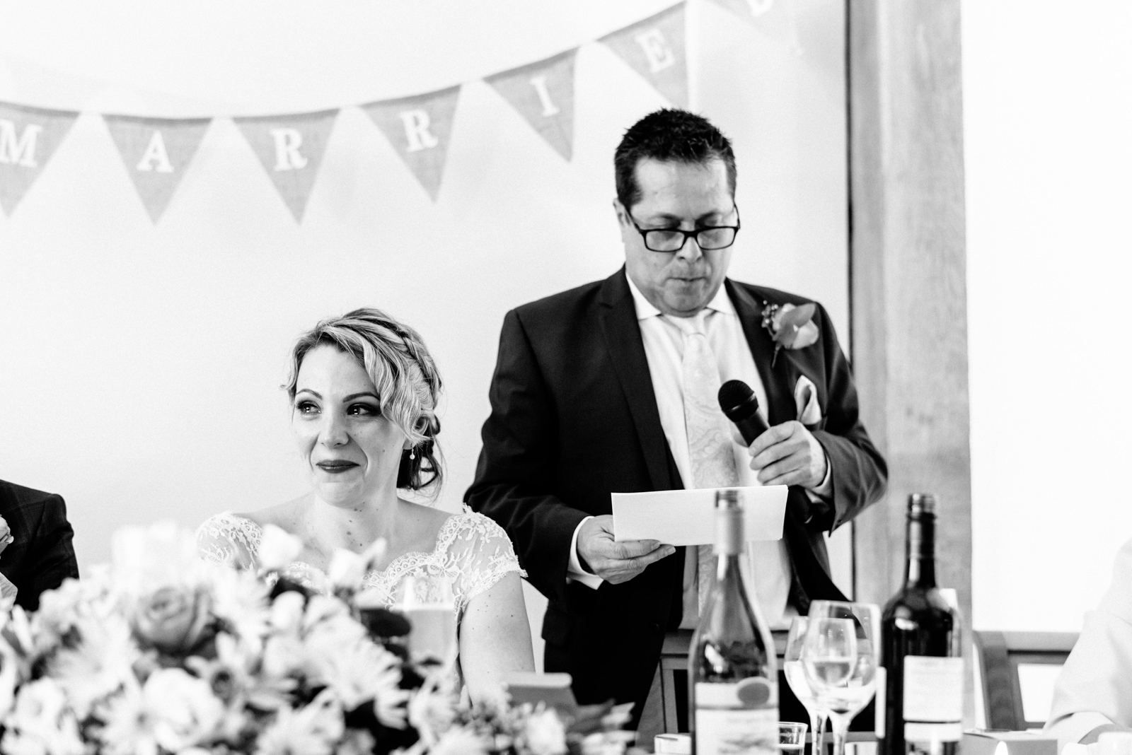 bride listening to fathers speech