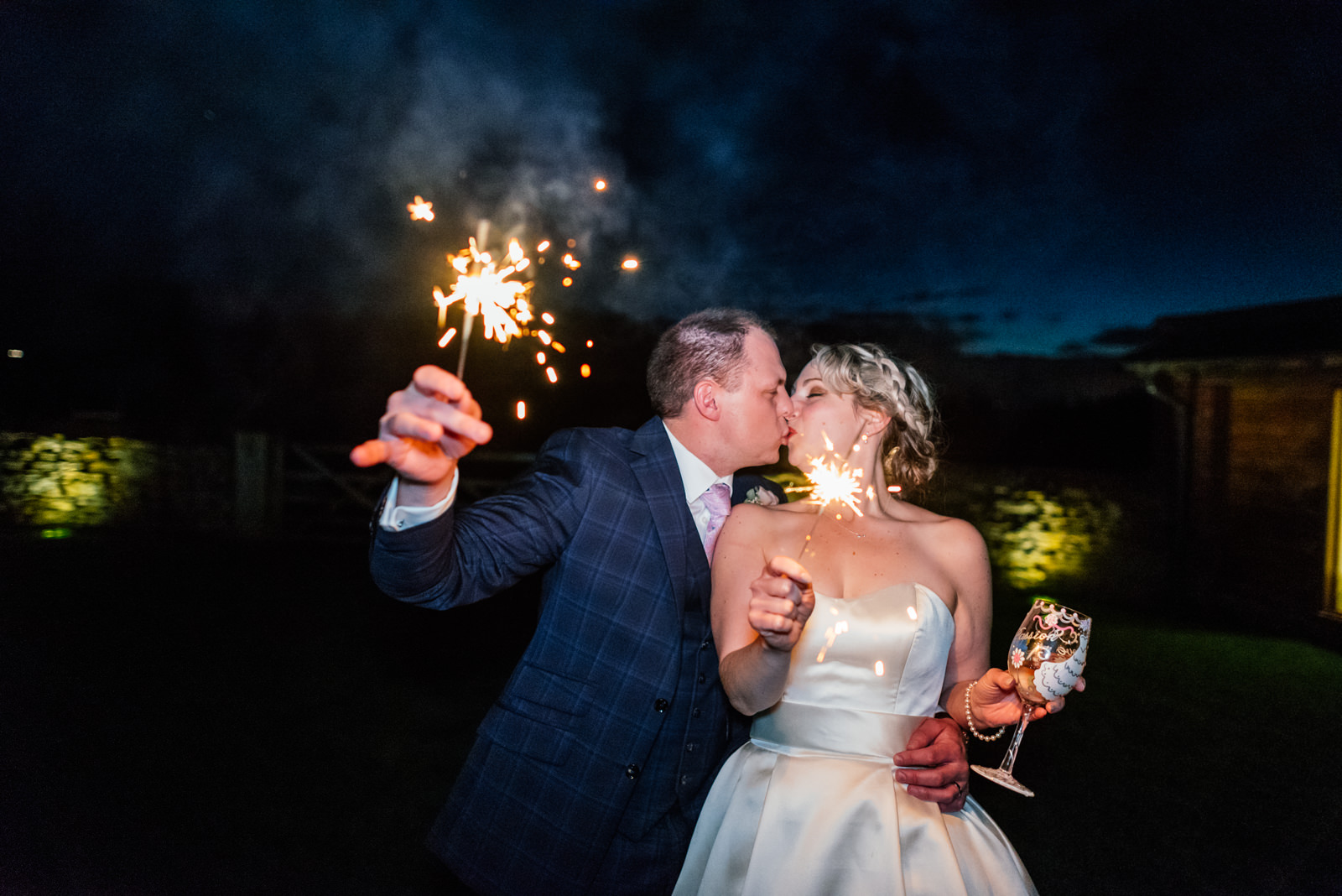 bride and groom with sparklers