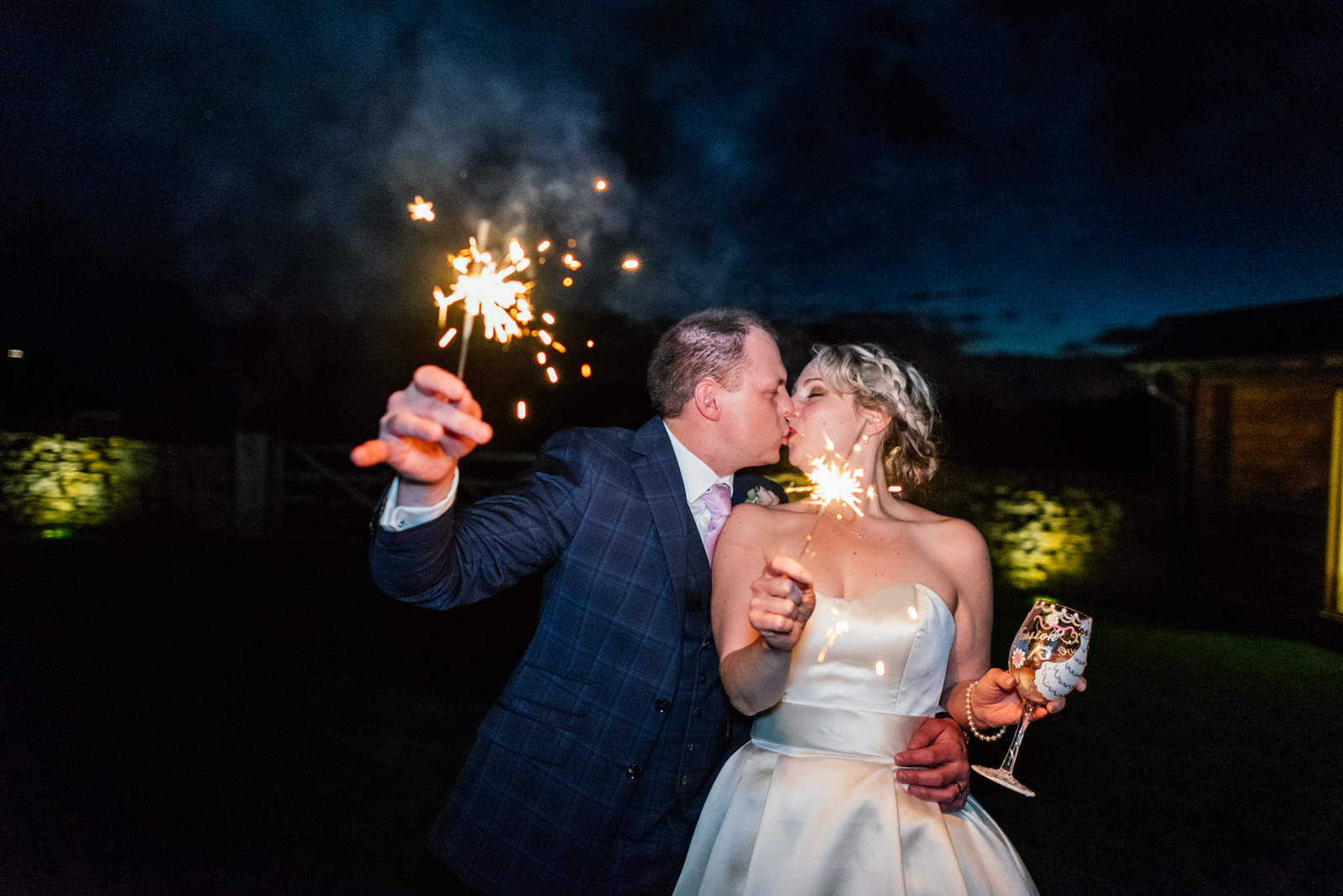 bride and groom with sparklers 