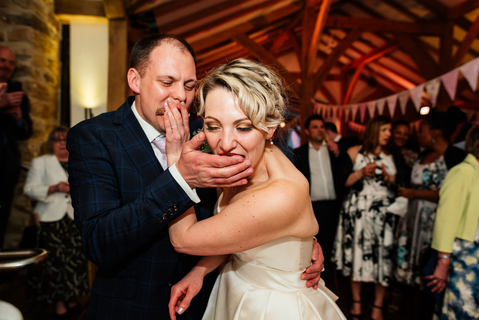 cake cutting - ram that cake in their face