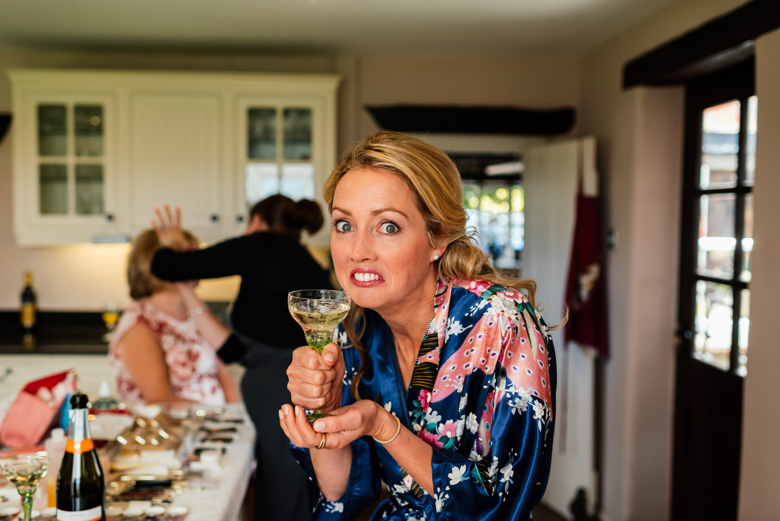 bridesmaid caught having a cheeky drink