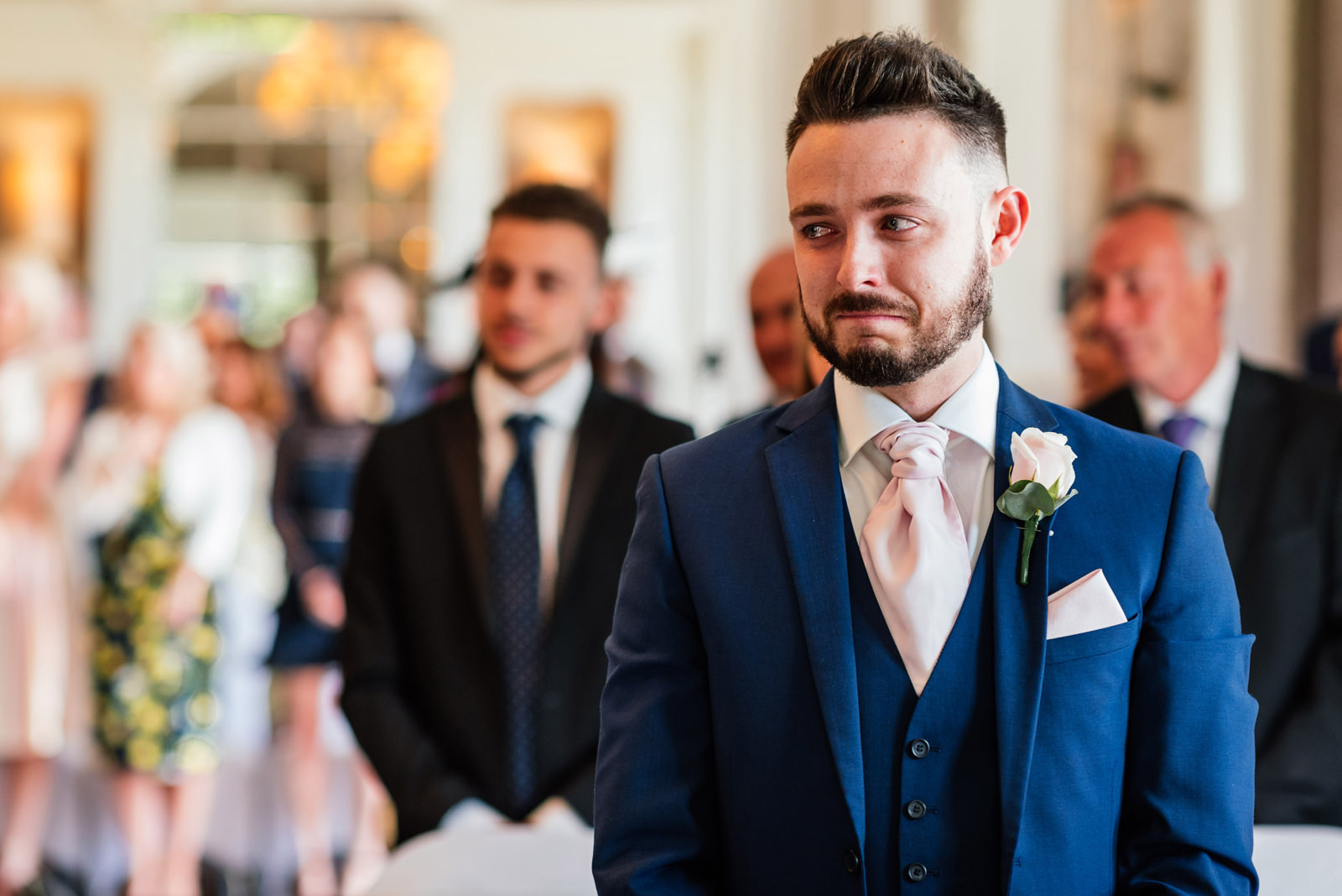 brother of the bride with a tear in his eye