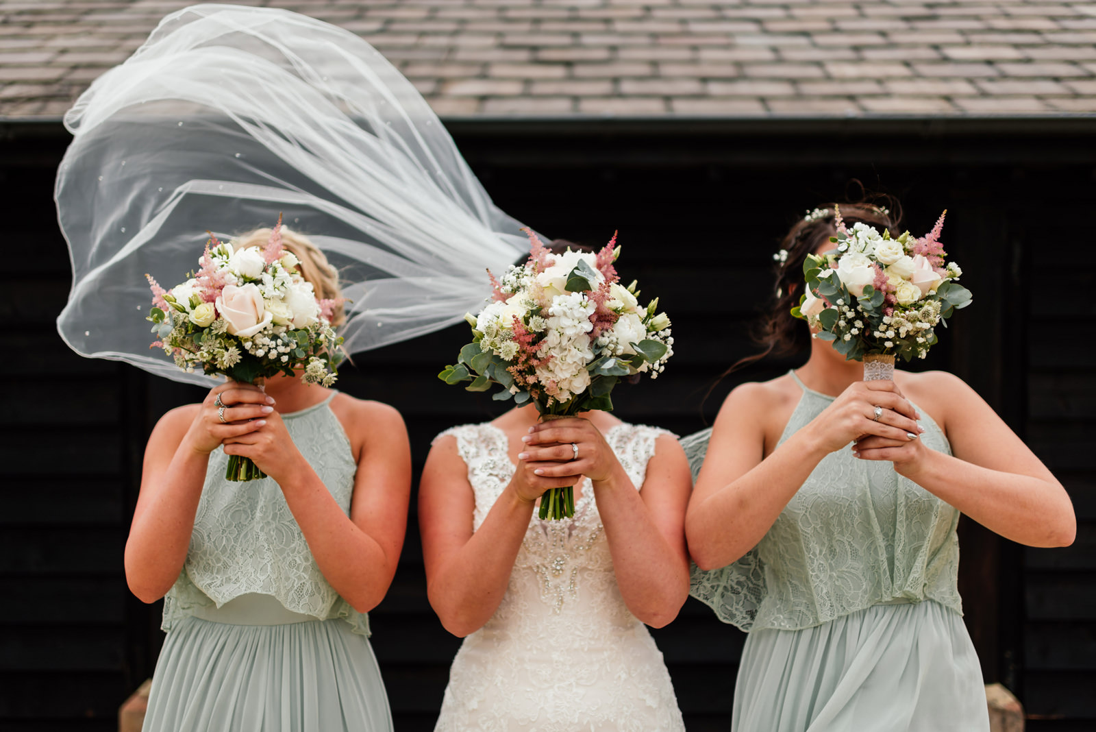 bridesmaids with bouquets