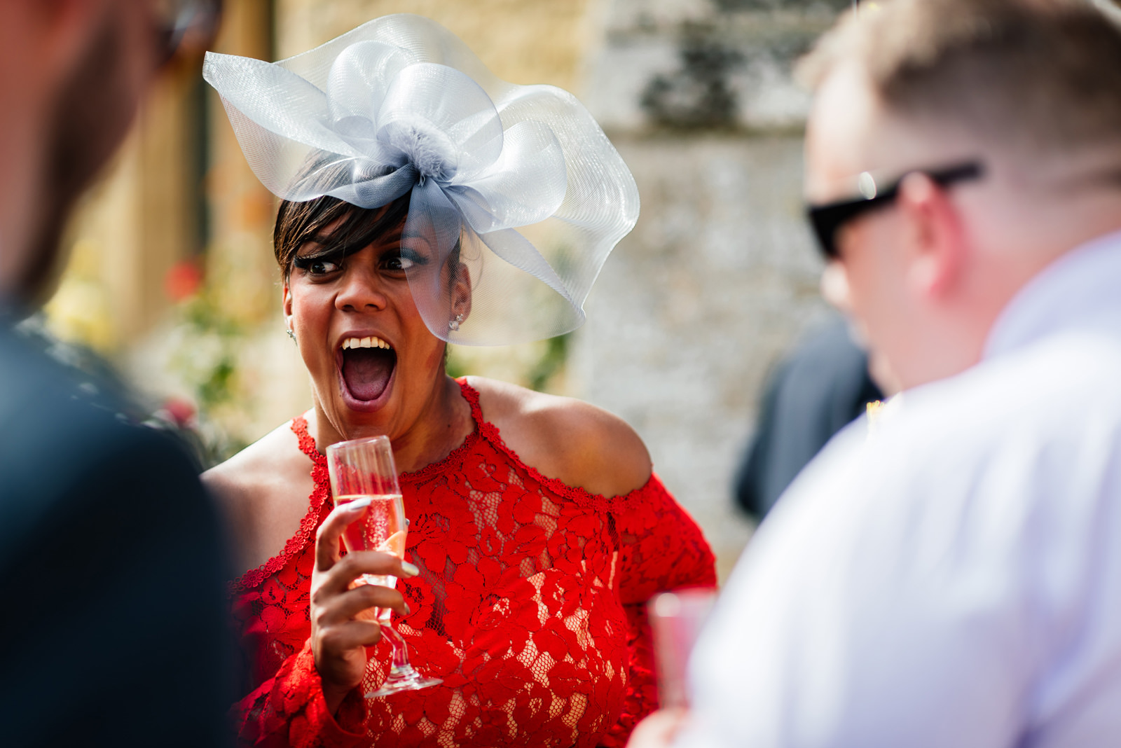 wedding guest laughing