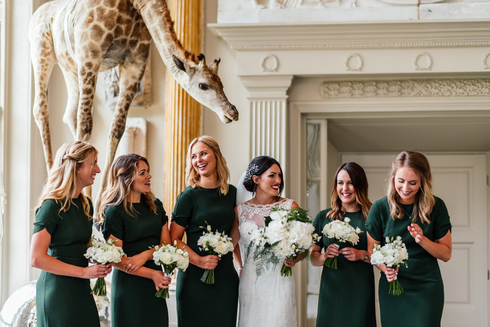 giraffe and bride and bridesmaids