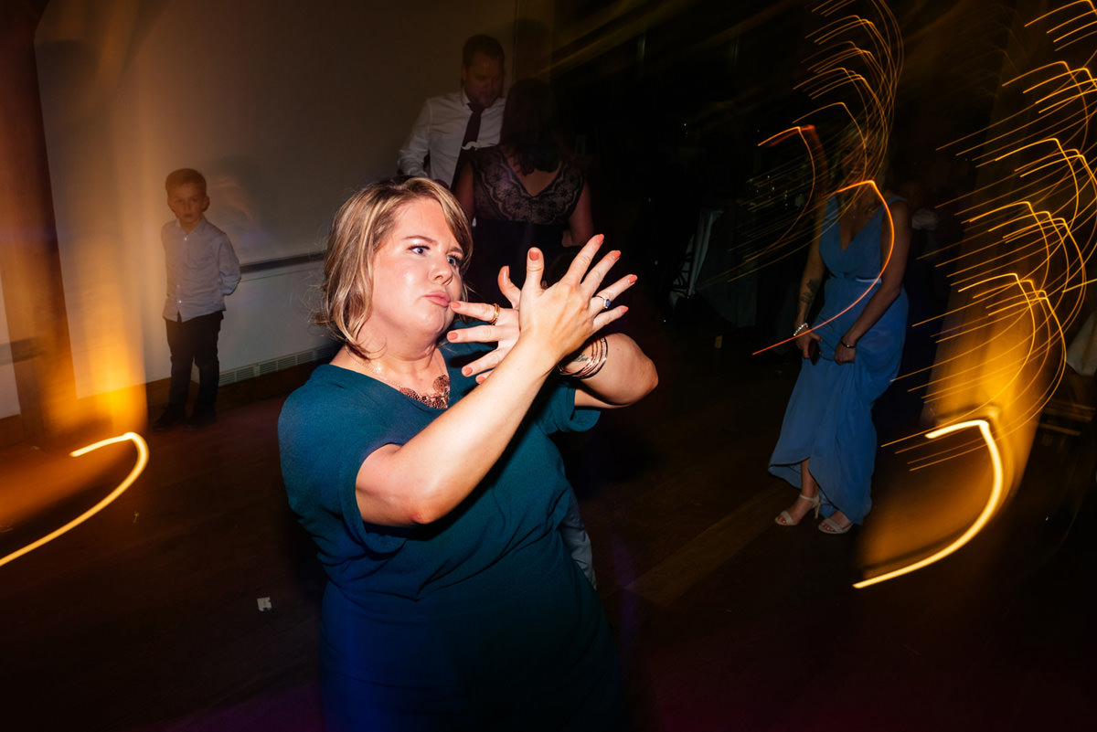 wedding guests throwing shapes