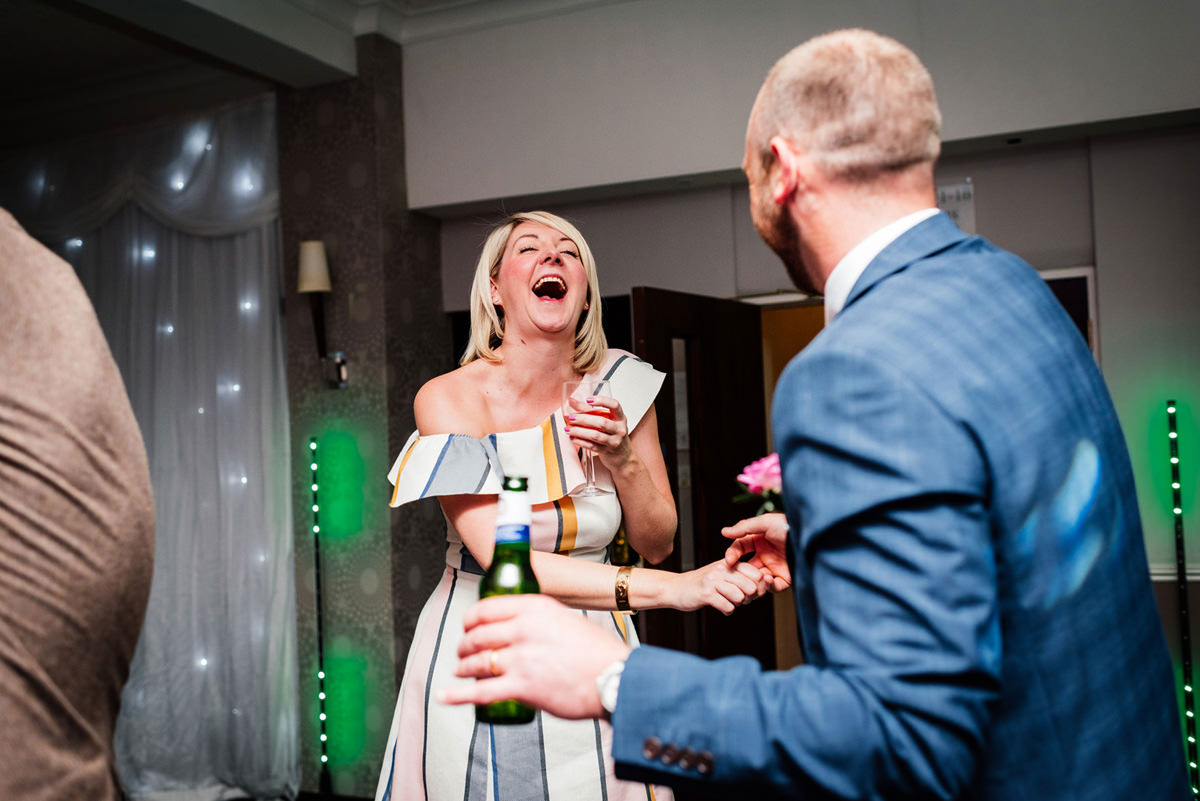 guests dancing at the wedding disco