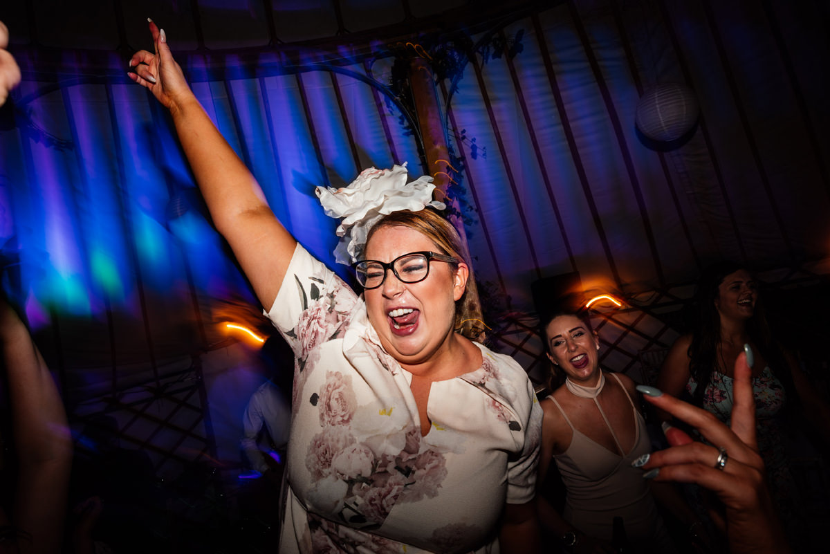 wedding guest throwing shapes on the dance floor