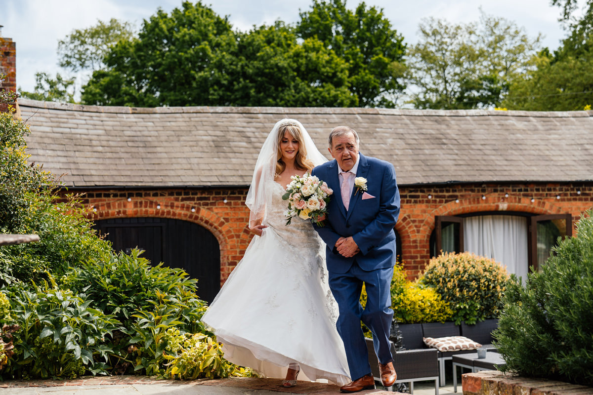bride walked to ceremony with her dad