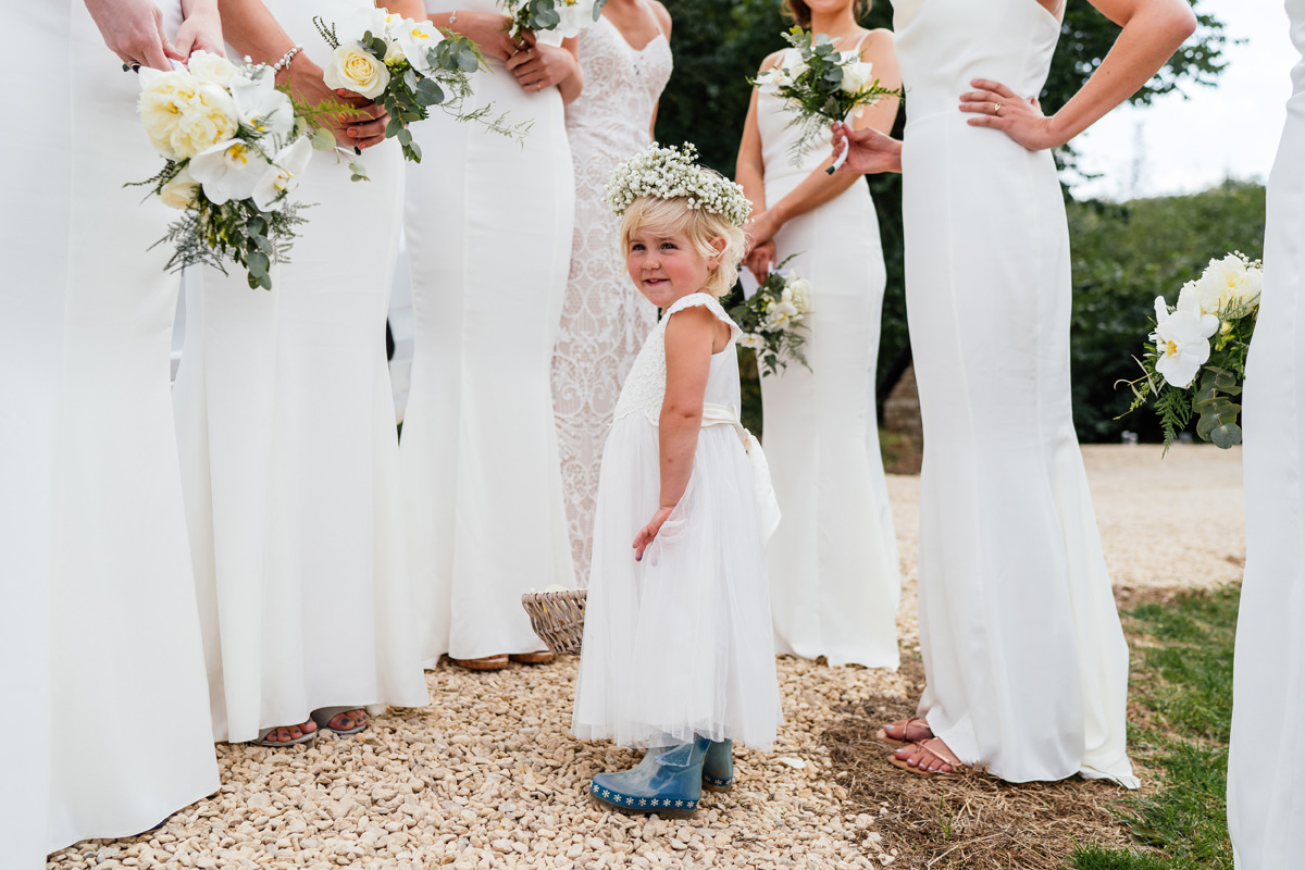 flower girl with bridesmaids