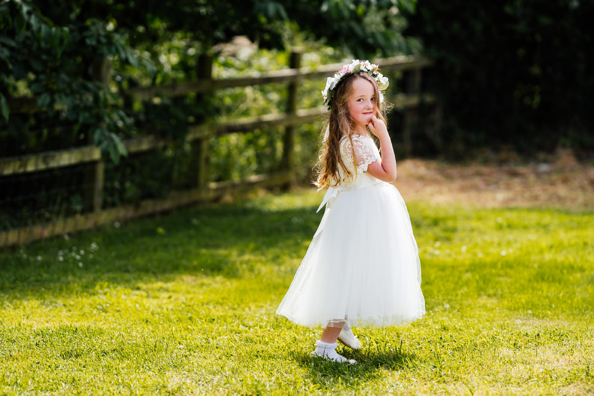 Flower girl playing outside