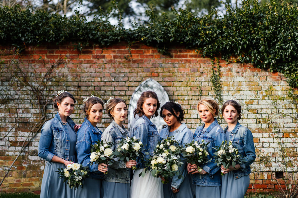 bride and bridesmaids group photo in the garden of Dodmoor House