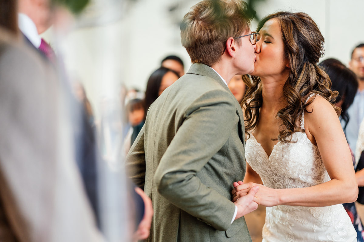 brides have their first kiss