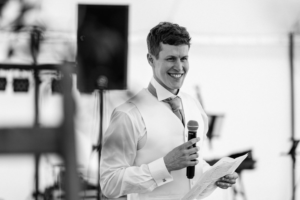 Groom giving his speech in the marquee
