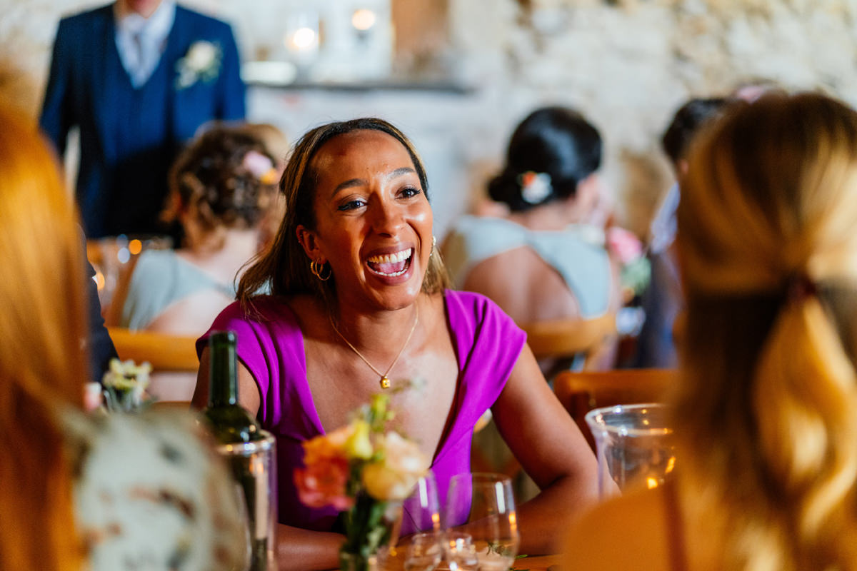 Guest laughing during the wedding breakfast